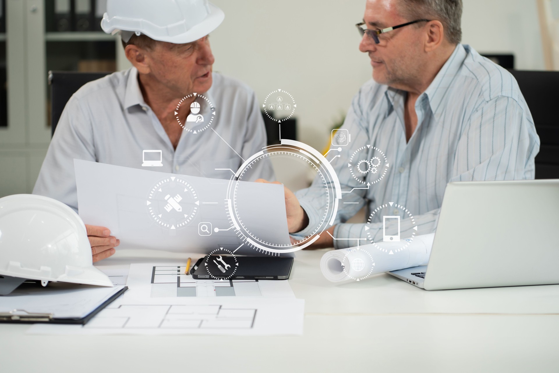 Engineering Team Collaborates on Blueprint Model in Corporate Office.